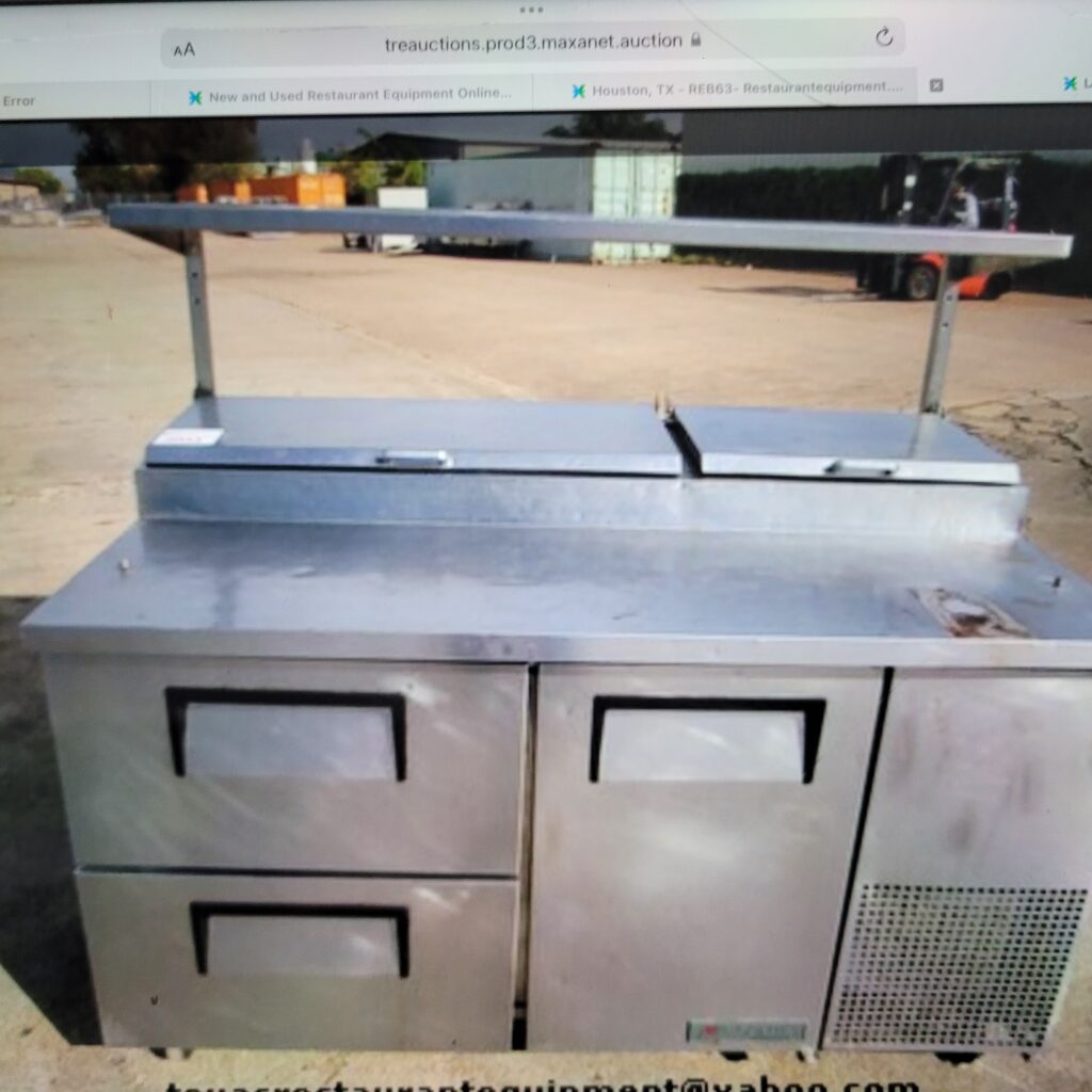 60”True Pizza PrepTables with casters and over head shelves Used